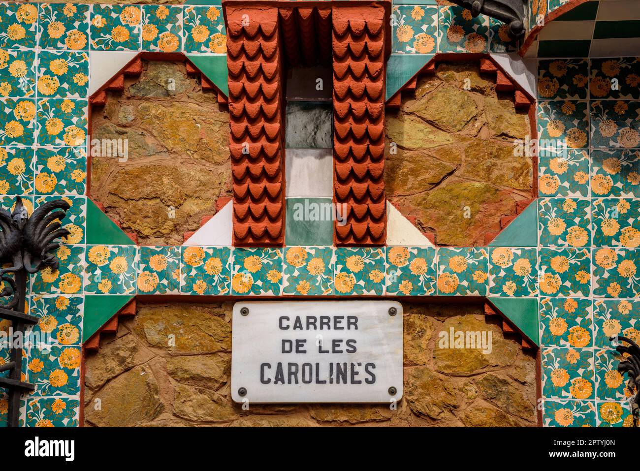 Detail of the exterior facade of the Casa Vicens, designed by Antoni Gaudí, with the sign of the Carolines street (Barcelona, Catalonia, Spain) Stock Photo