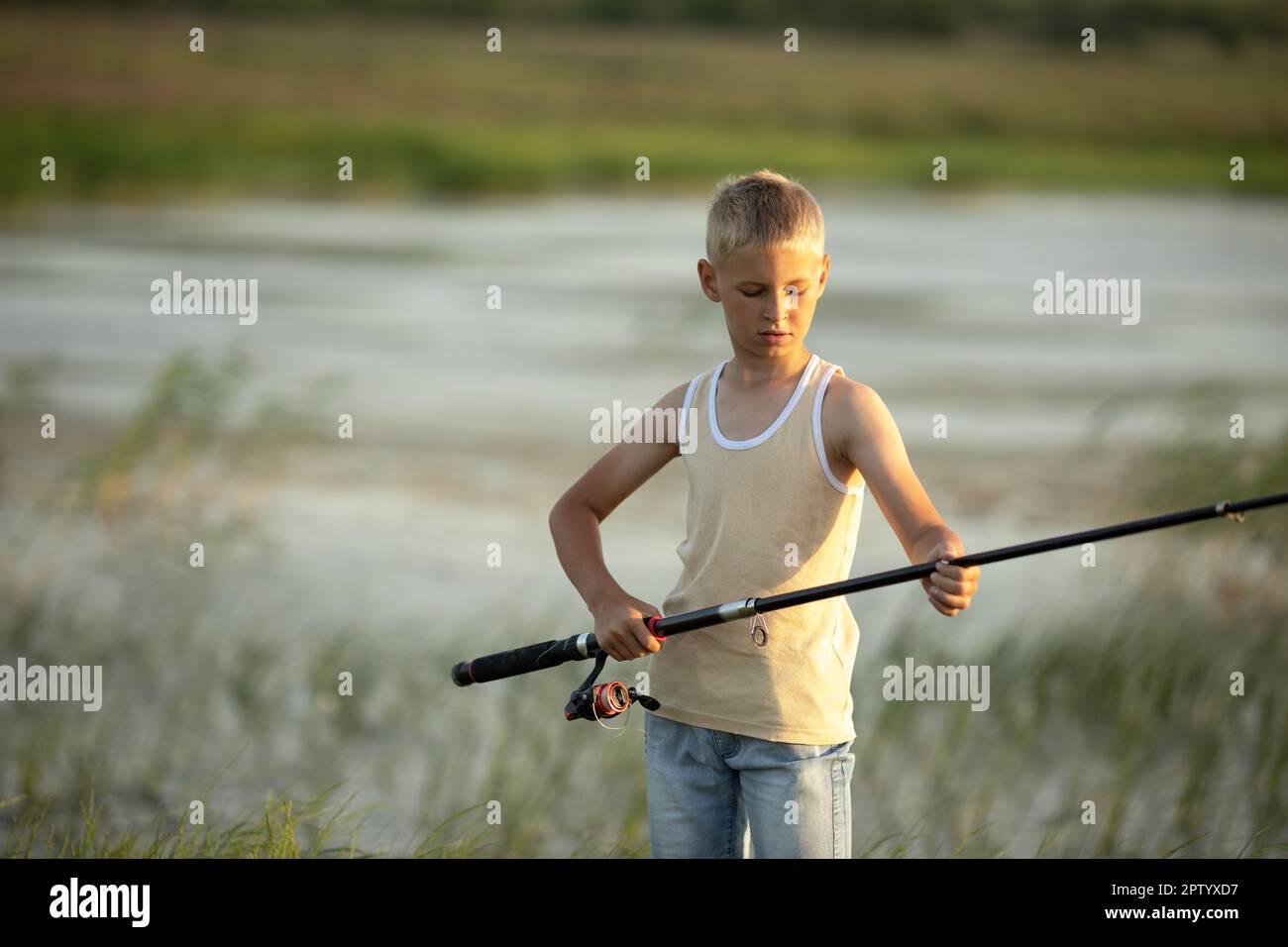 5,700+ Man Holding Fishing Rod Stock Photos, Pictures & Royalty