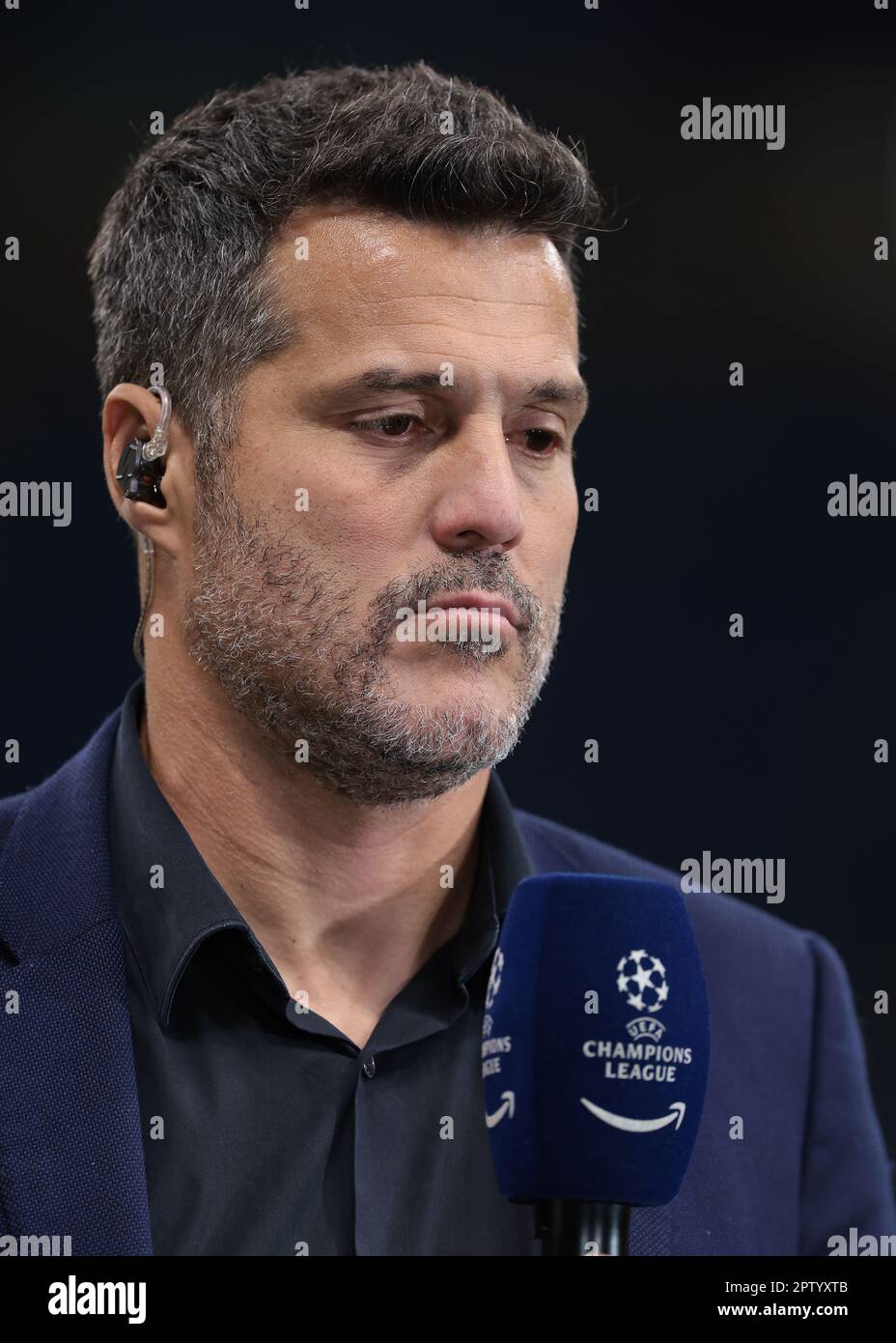 Milan, Italy, 19th April 2023. Former FC Internazionale and Brazil goalkeeper Julio Cesar reacts as he holds a UEFA Champions League and Amazon Prime branded microphone as he comments following the UEFA Champions League match at Giuseppe Meazza, Milan. Picture credit should read: Jonathan Moscrop / Sportimage Stock Photo