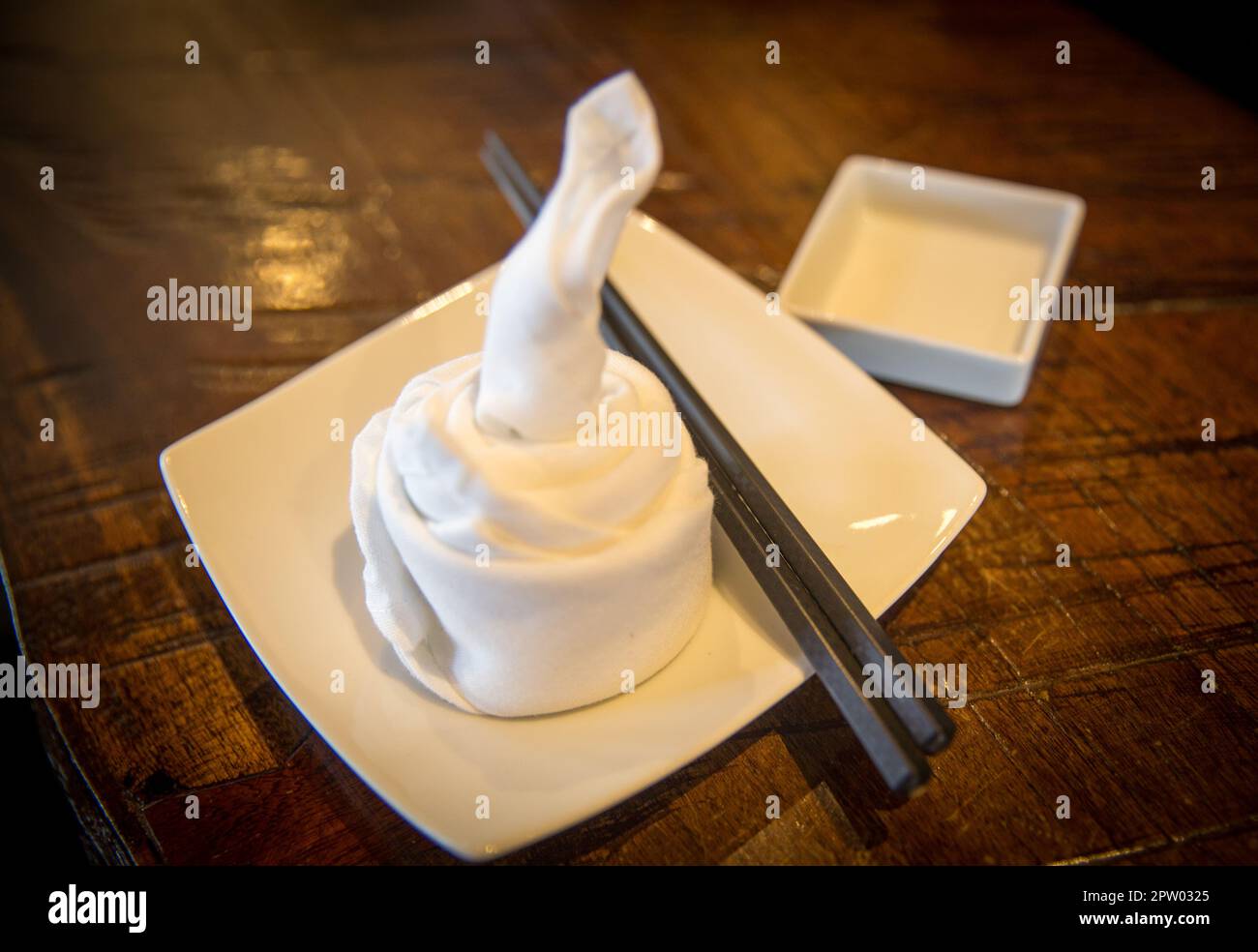 Japanese style napkin placement with chopsticks Stock Photo Alamy