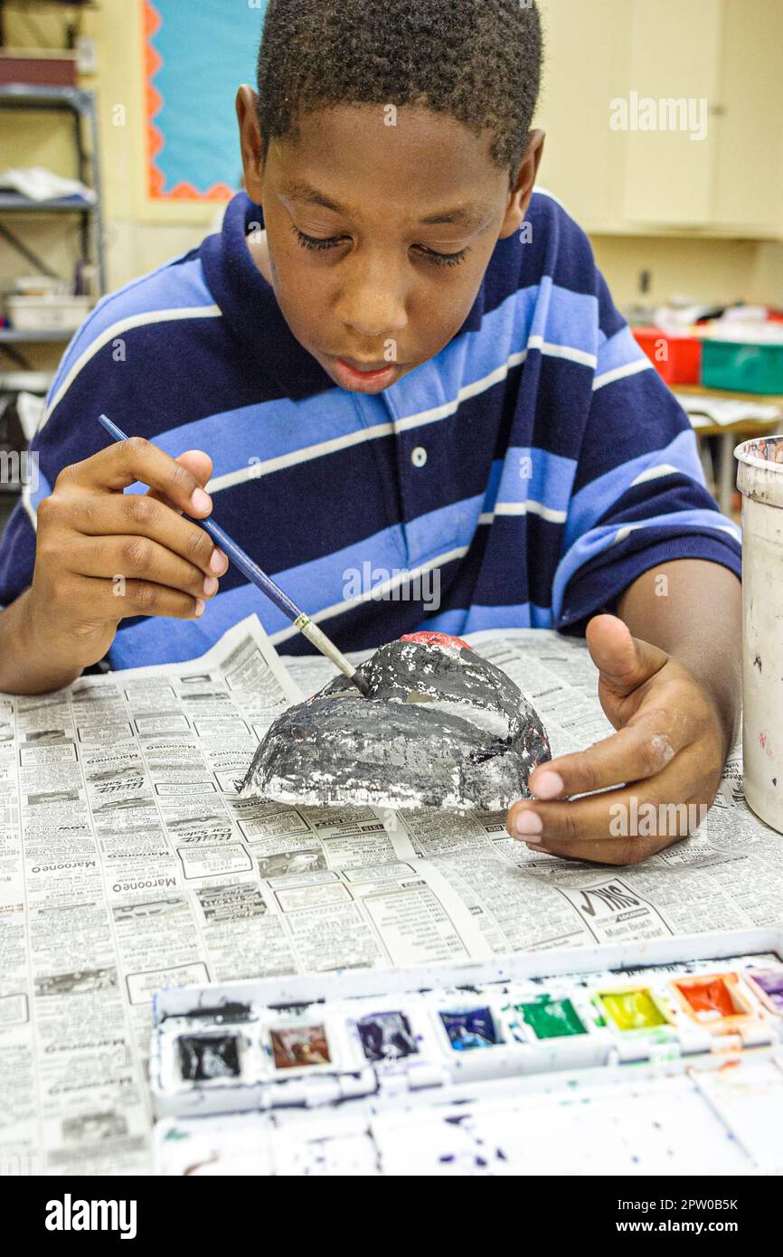 Miami Florida,Frederick Douglass Elementary School campus primary,inner city school art class,student students Black African Africans,boy boys male pa Stock Photo