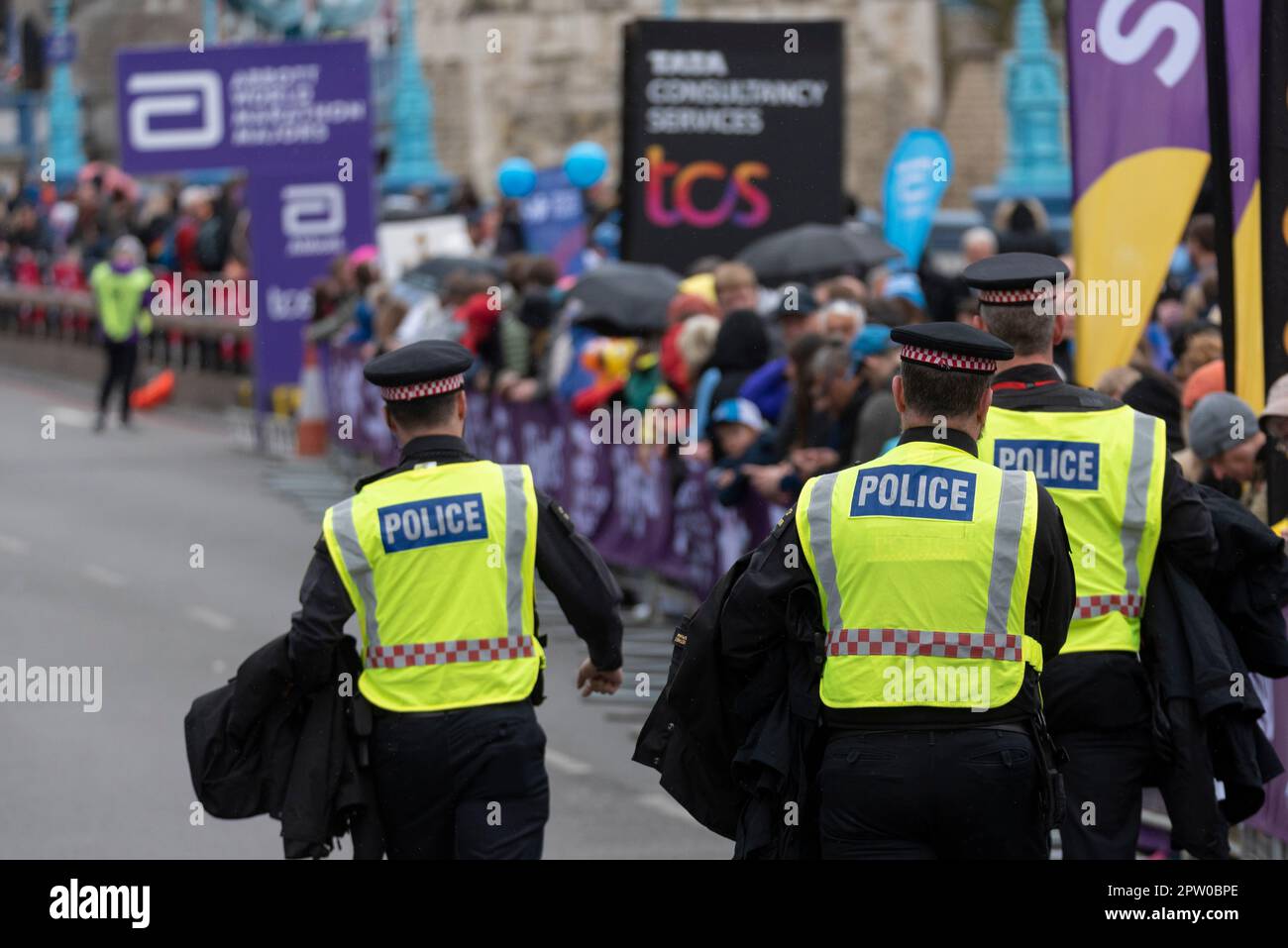 Police officers arriving to provide security around a group of Just