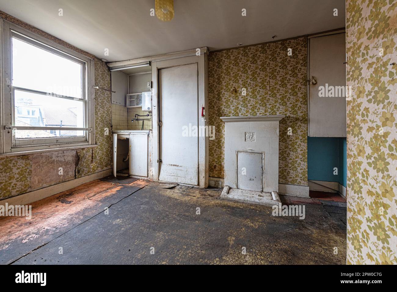 Interior Photo of a filthy unmodernised Kitchen in South London. Stock Photo
