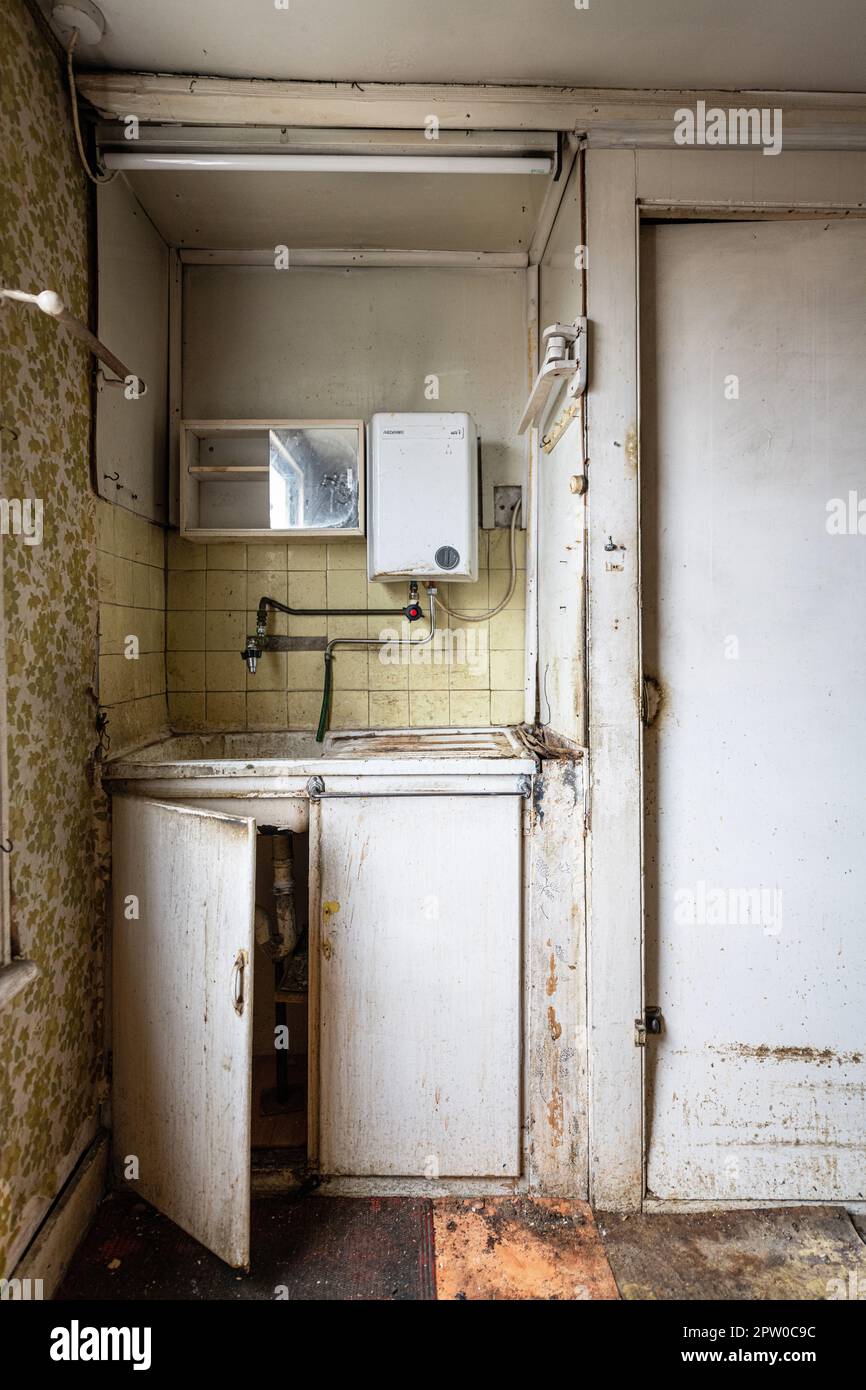 Interior Photo of an old kitchen in an old unmodernised house in South London . Stock Photo