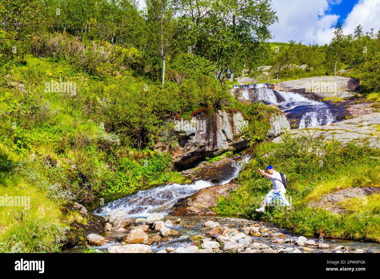 Man jumping in a river hi-res stock photography and images - Alamy