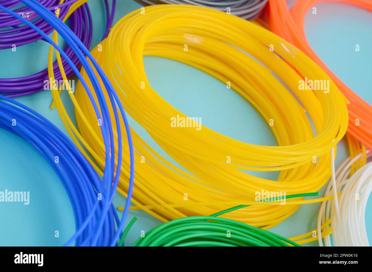 3D printing pen filaments of various colors. Plastic PLA and ABS
