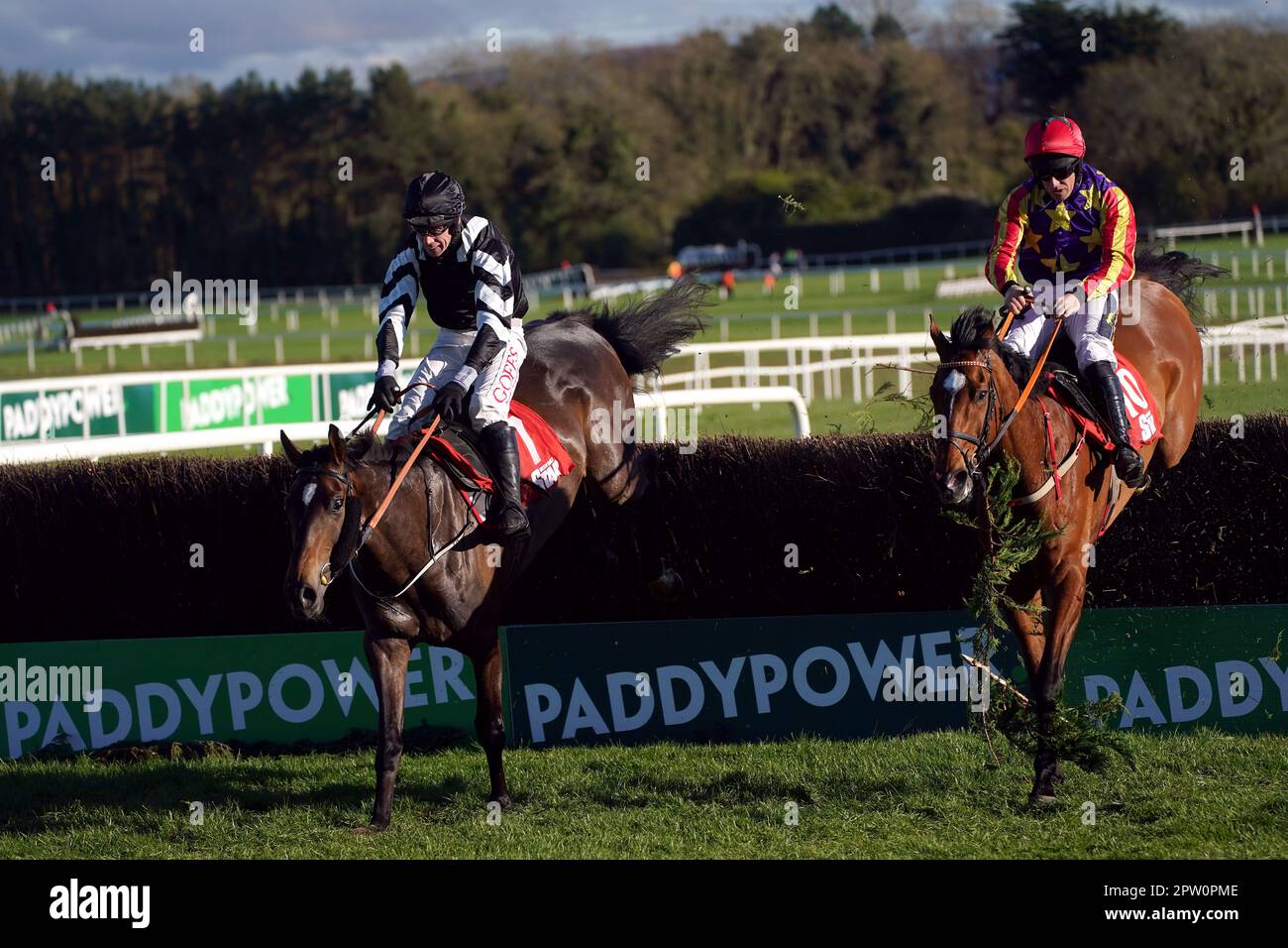 Its On The Line ridden by jockey Derek O'Connor (left) clear the last fence on their way to winning the Irish Daily Star Champion Hunters Chase on day four of the Punchestown Festival at Punchestown Racecourse in County Kildare, Ireland. Picture date: Friday April 28, 2023. Stock Photo