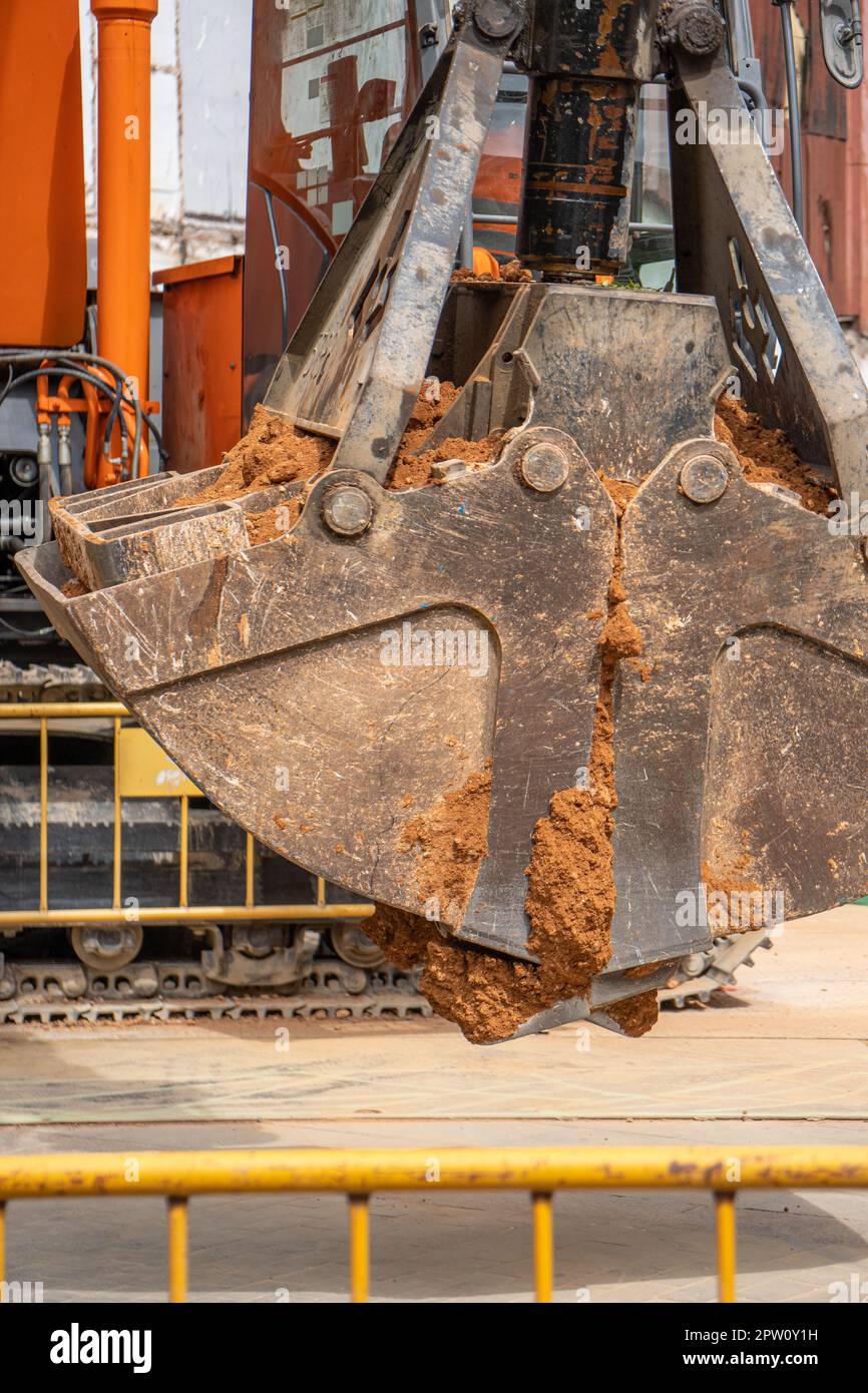 Hydraulic bucket excavator bucket excavator moving earth at excavation