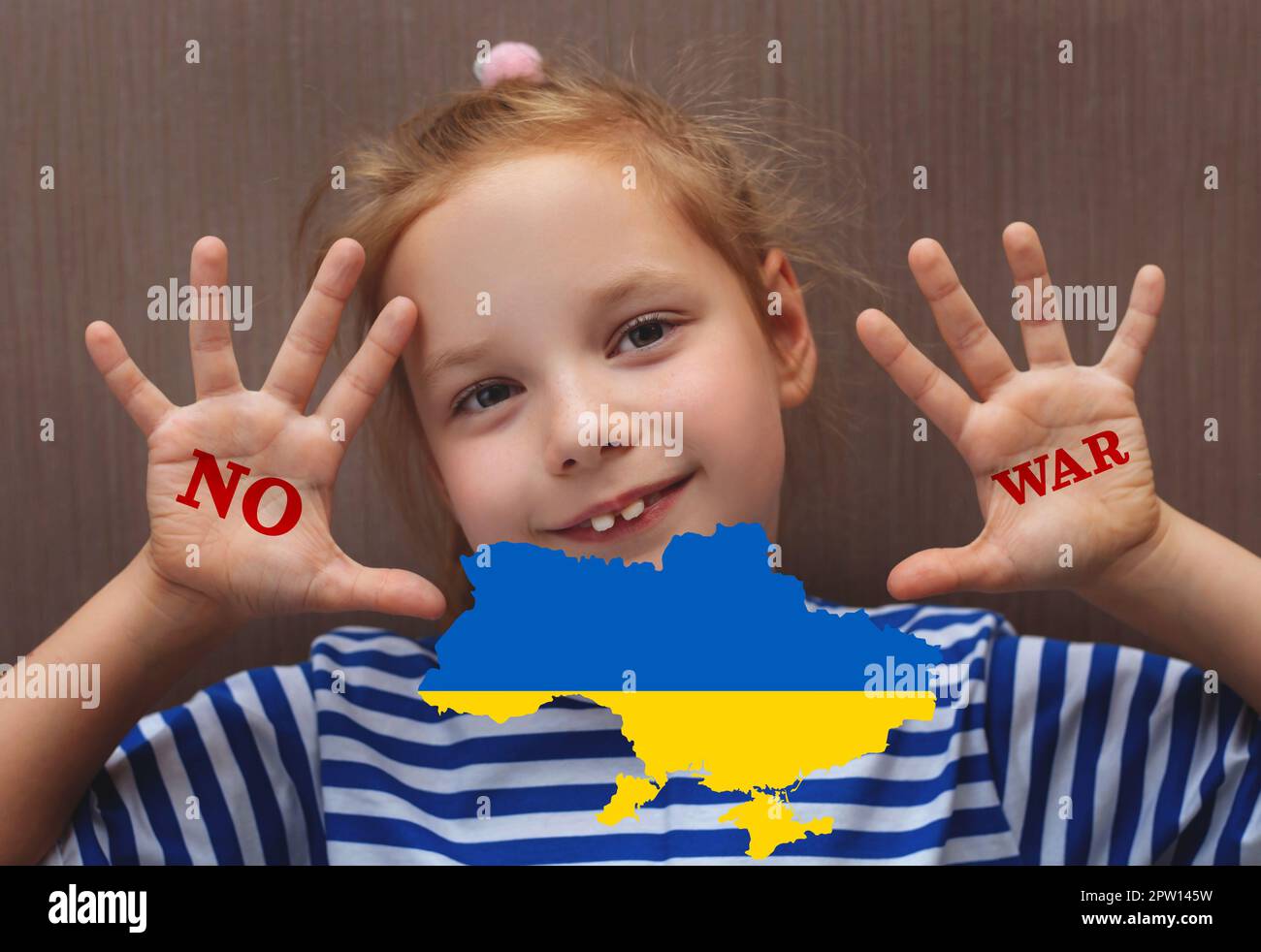 Ukrainian child says stop the war Stock Photo