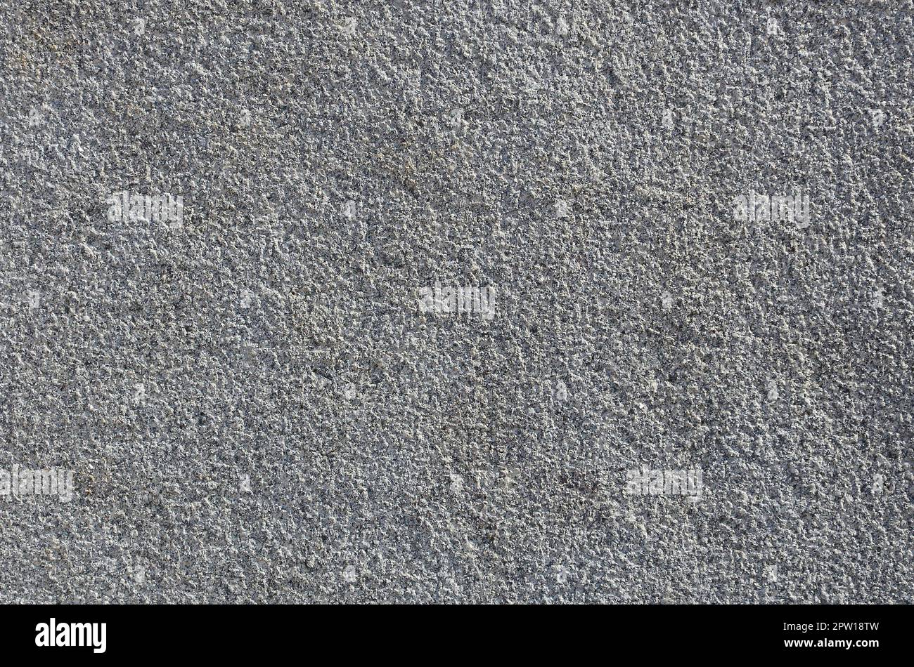 Texture of rough concrete wall with embossed texture. Smooth gray surface Stock Photo