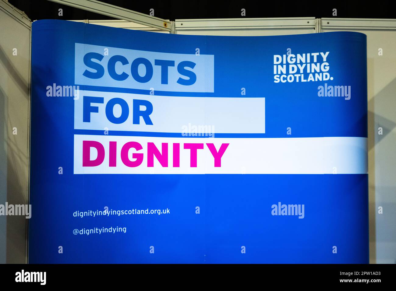 Dignity in Dying Scotland - Scots For Dignity sign on stand at Scottish Conservative Conference 2023, Glasgow, Scotland, UK Stock Photo