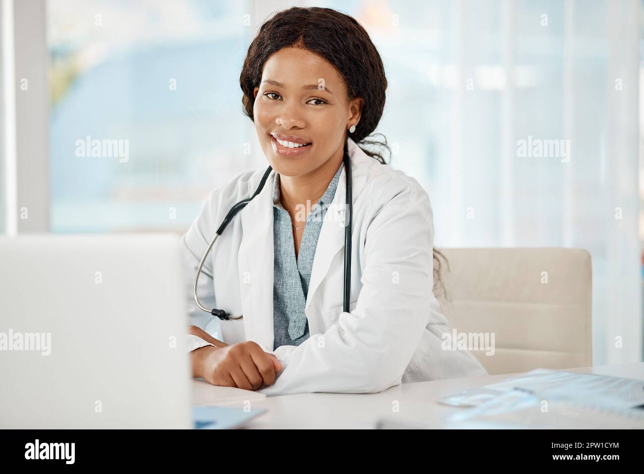 Black female doctor office sitting hi-res stock photography and images ...