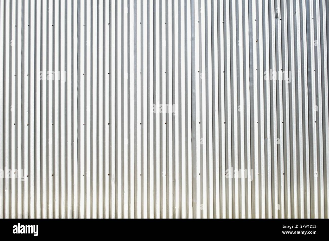 Bright silver corrugated metal sheet background Stock Photo