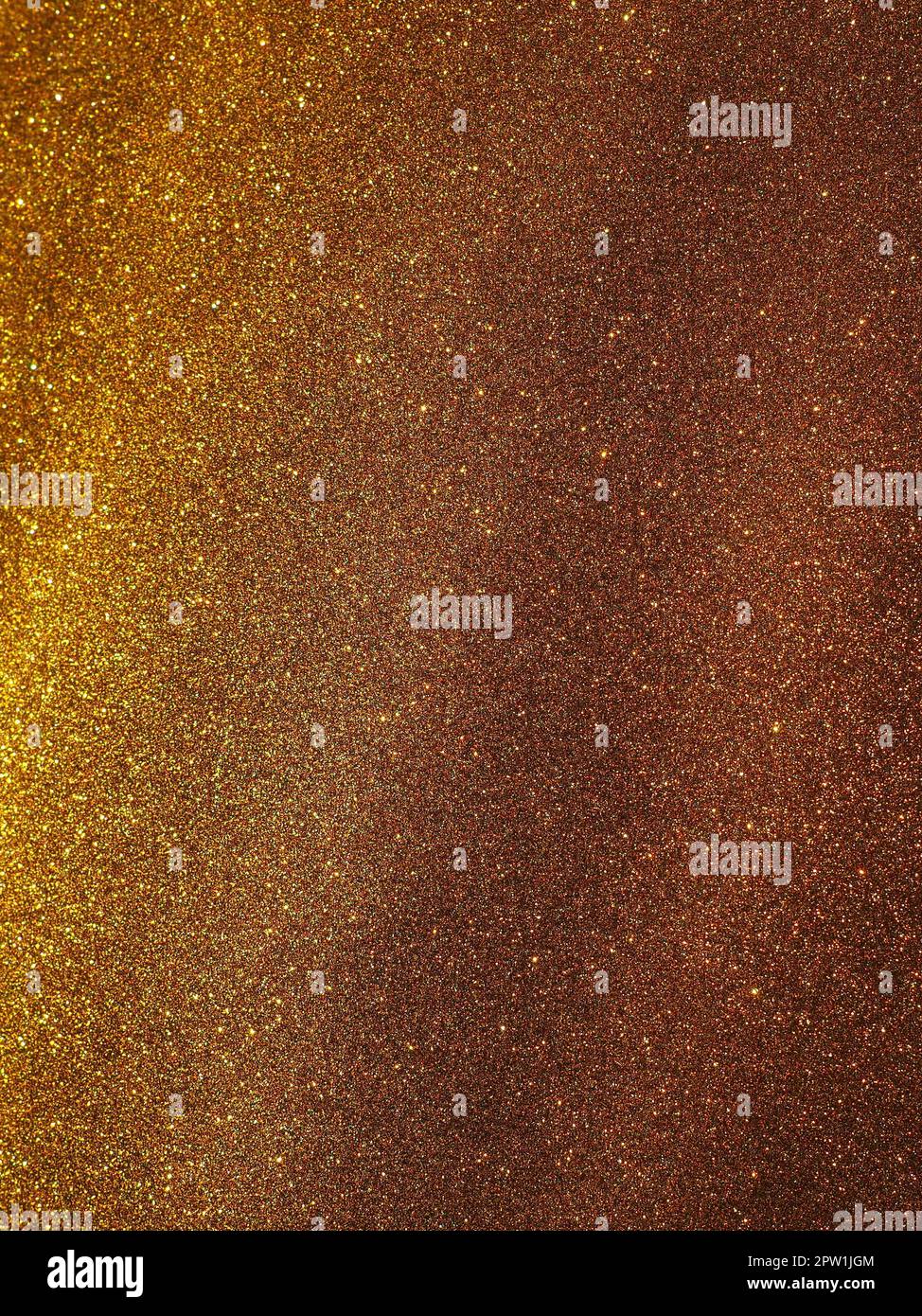 Bokeh light of gold glitters. Golden glitter texture background ...