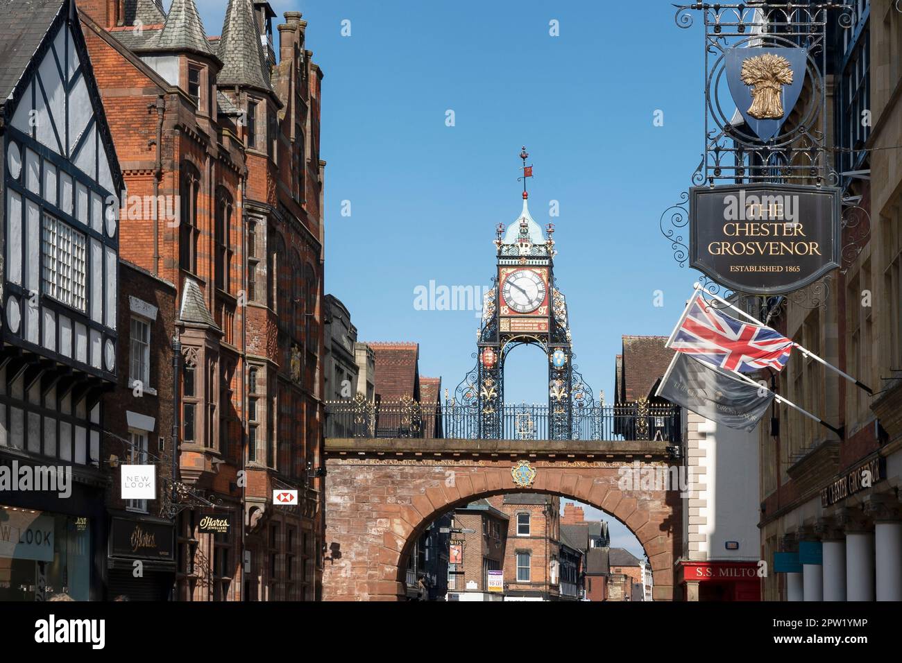 The Eastgate Clock and the Chester Grosvenor hotel on Eastgate Street Chester UK Stock Photo