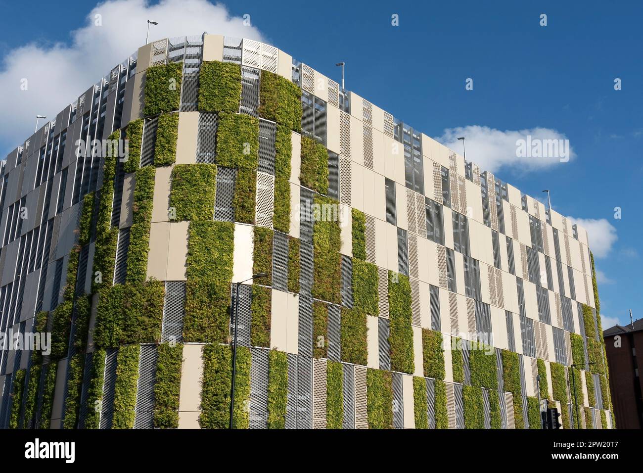 The exterior of a new multi storey car park featuring a green living wall that forms part of the New Market Development in Chester city centre uk Stock Photo
