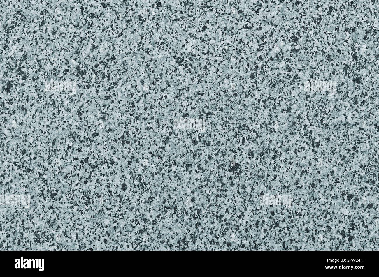 The texture of solid granite tiles. Hard and slippery gray granite
