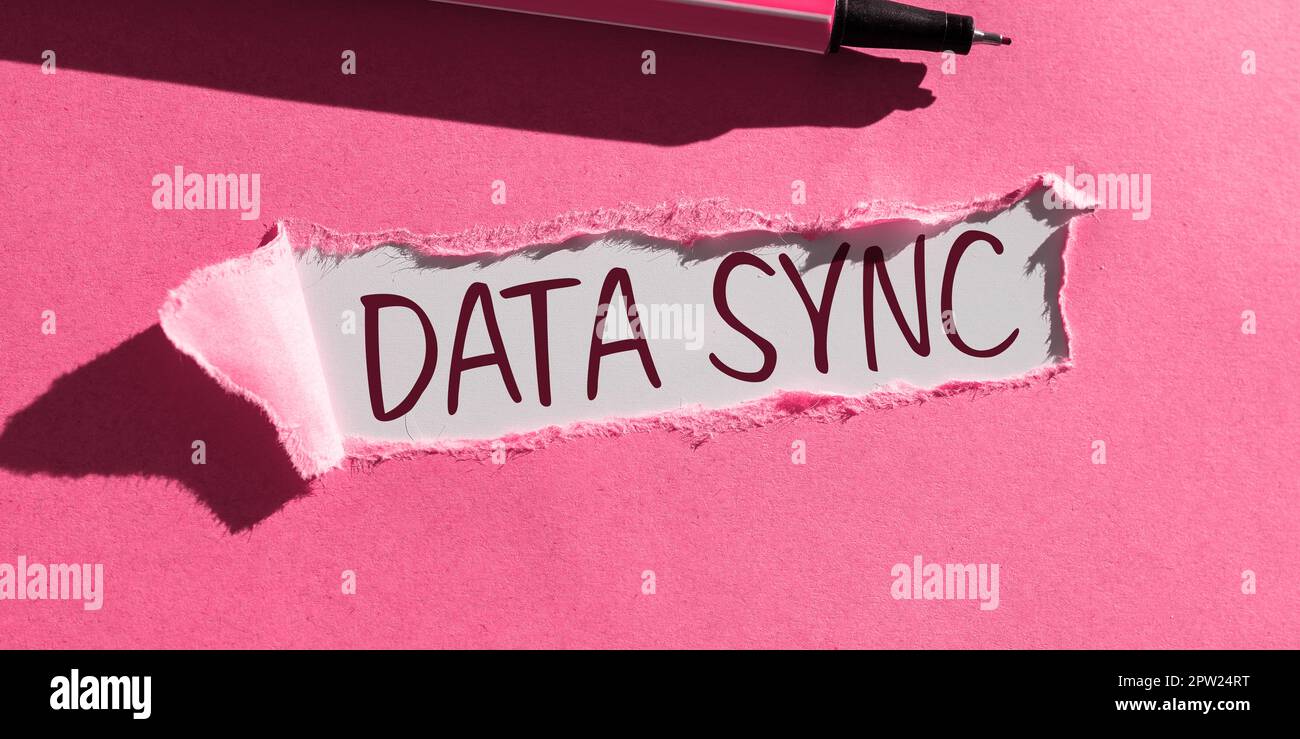 Writing displaying text Data Sync, Business overview data that is continuously generated by different sources Stock Photo