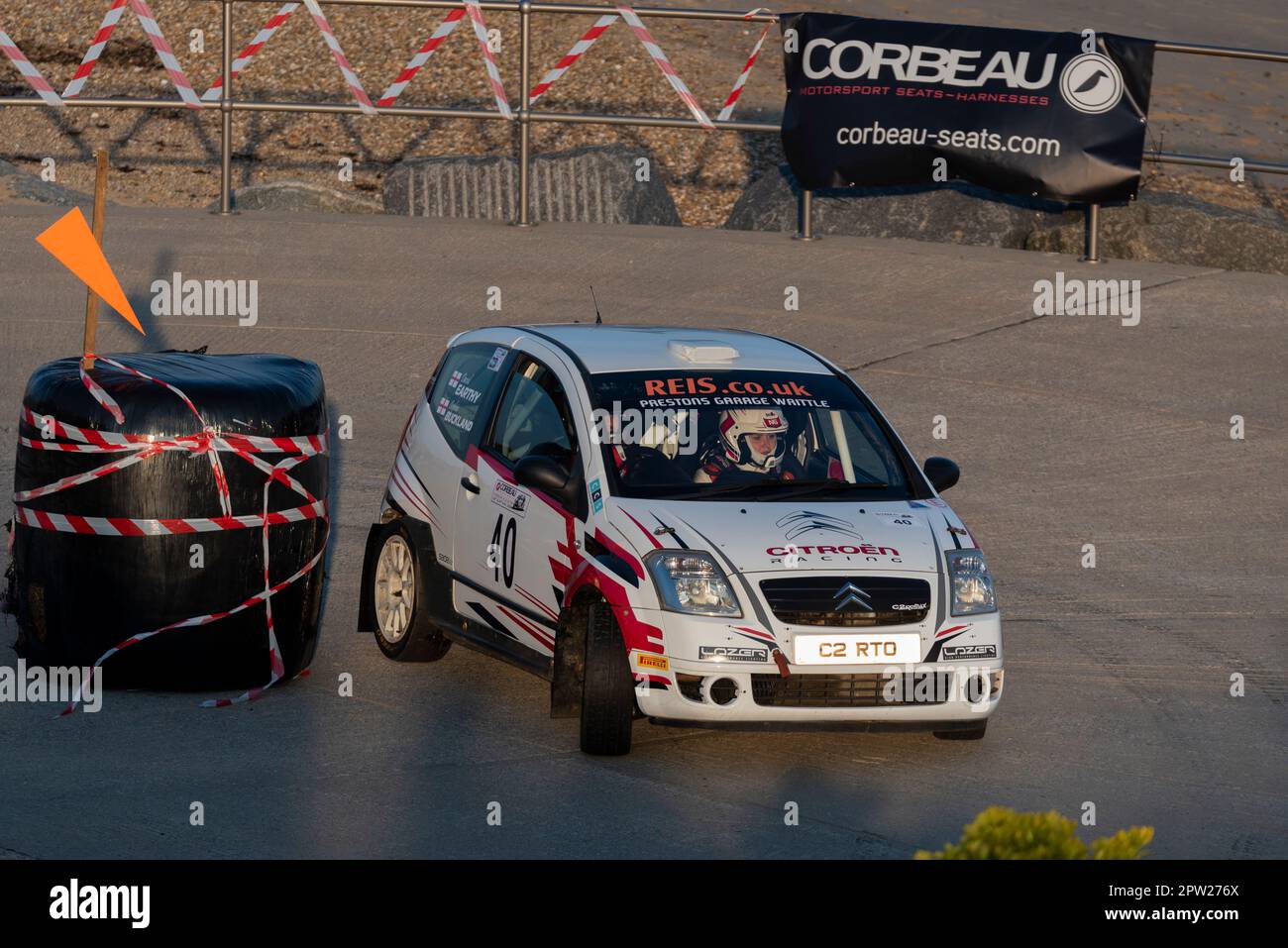 David Earthy racing a Citroen C2 R2 Max competing in the Corbeau Seats rally on the seafront at Clacton on Sea, Essex, UK. Co driver Sophie Buckland Stock Photo