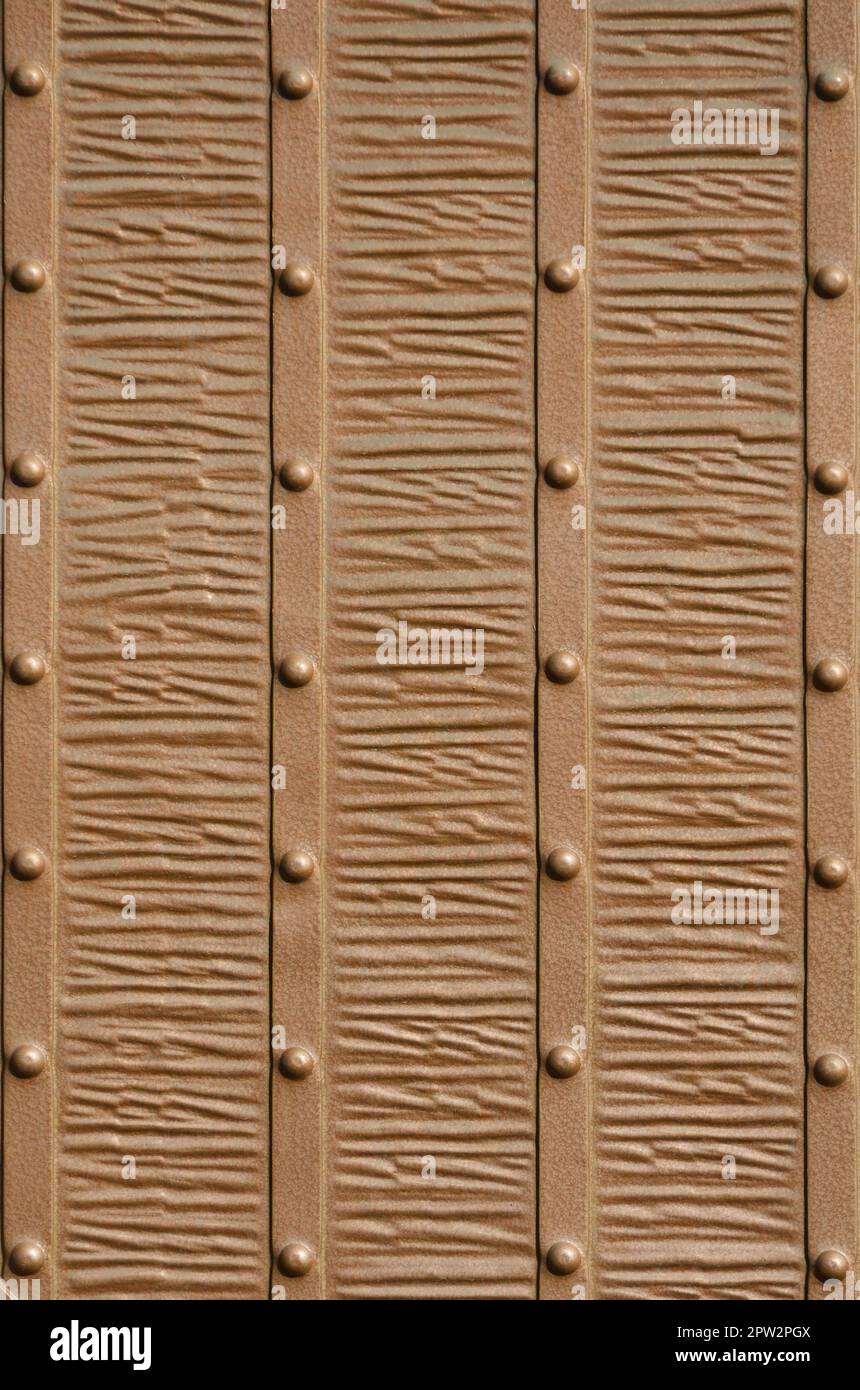 The texture of the fragment of the ancient bronze gate Stock Photo - Alamy