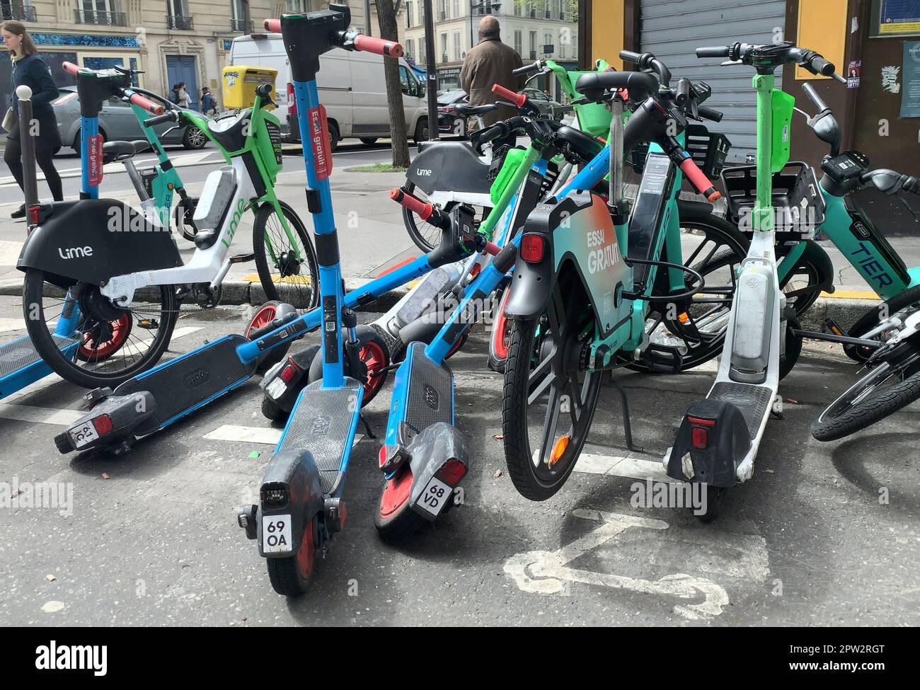 Paris, France. 28th Apr, 2023. Selfservice scooters are scattered on the pavement at a street