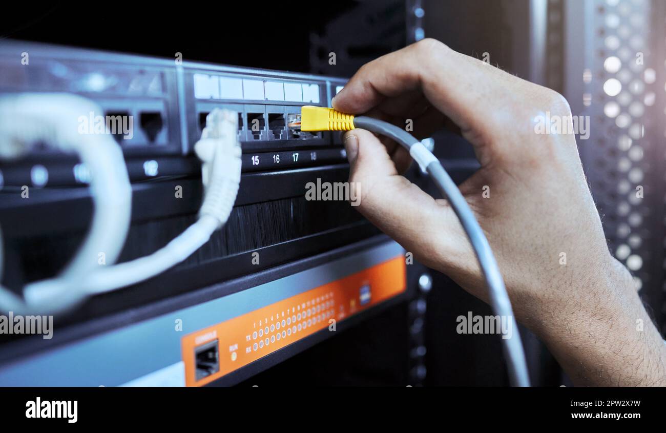 Hands, network engineer and server cable in server room for data