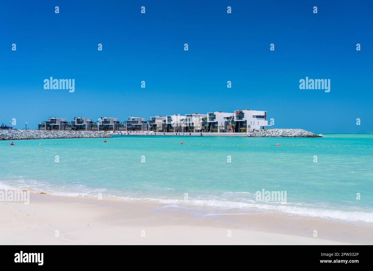 View from Jumeirah public beach of the construction of apartments and condos by Marsa al Arab hotel on coast of Dubai Stock Photo