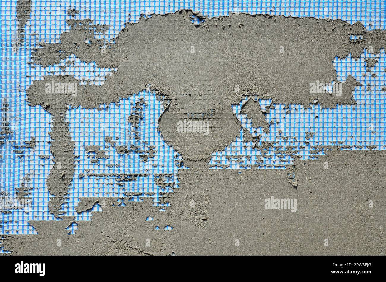 The texture of the wall, covered with gray foam polystyrene plates ...