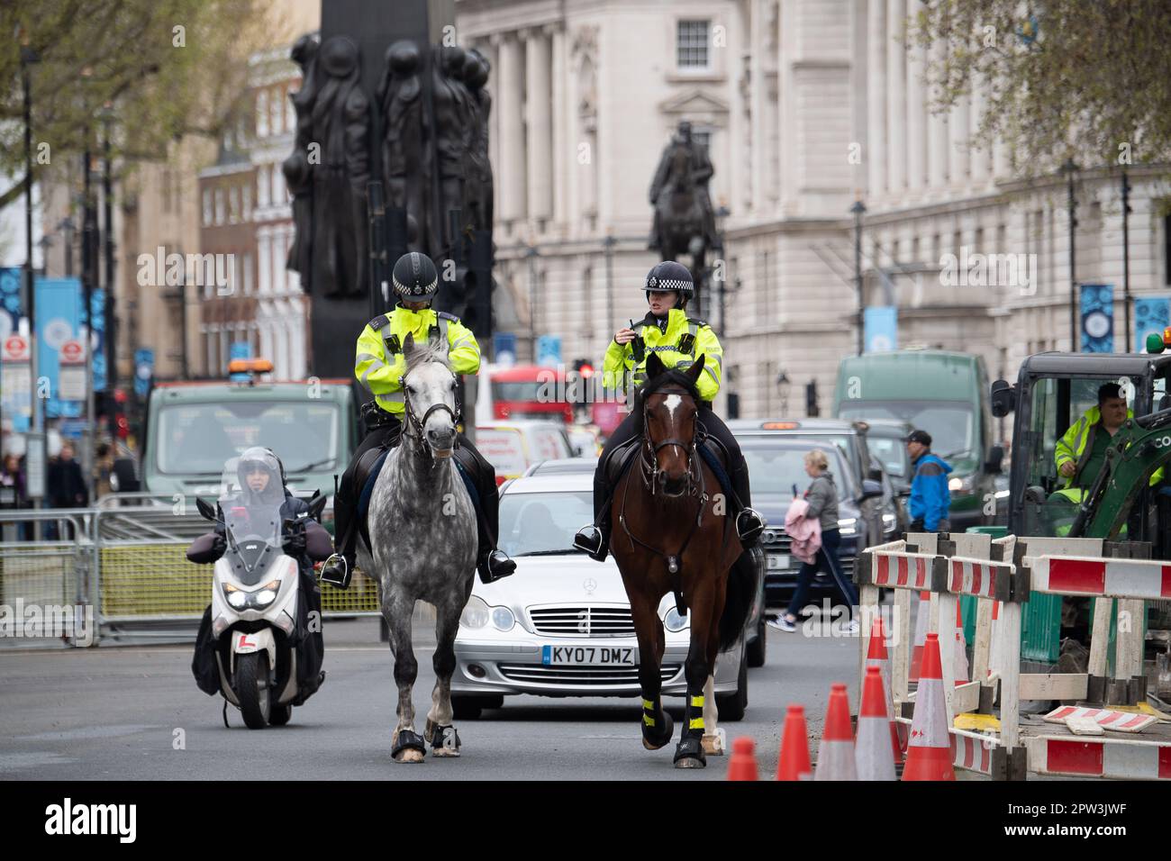 London, UK. 28th April, 2023. Police horses on patrol in Whitehall. It ...