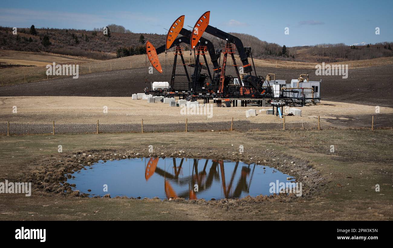 Calgary, Canada. 28th Apr, 2023. Pumpjacks draw out oil and gas from