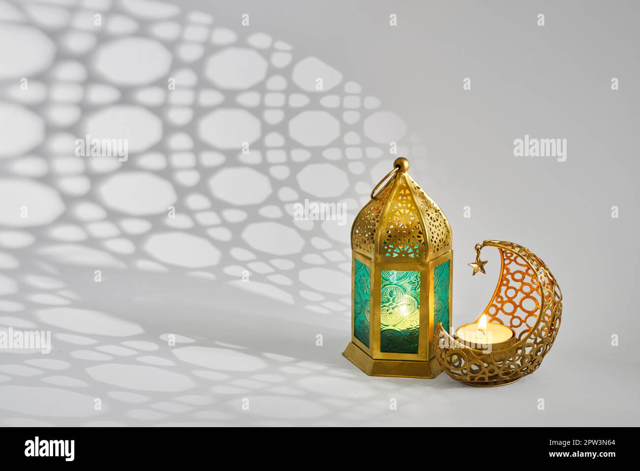 Islamic background with ramadan lantern and crescent moon Stock Photo ...