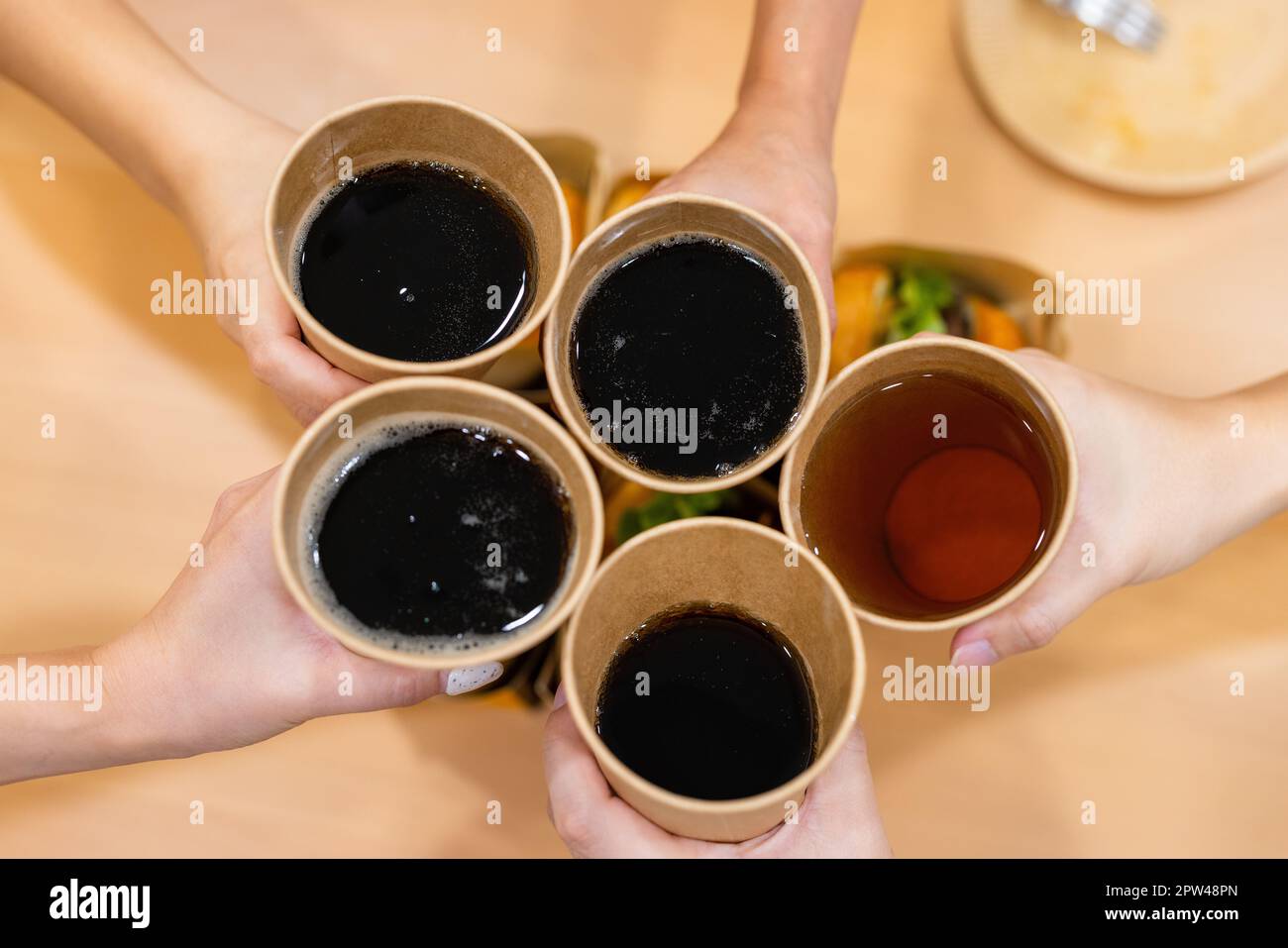Paper cup with soft drink at party time Stock Photo - Alamy