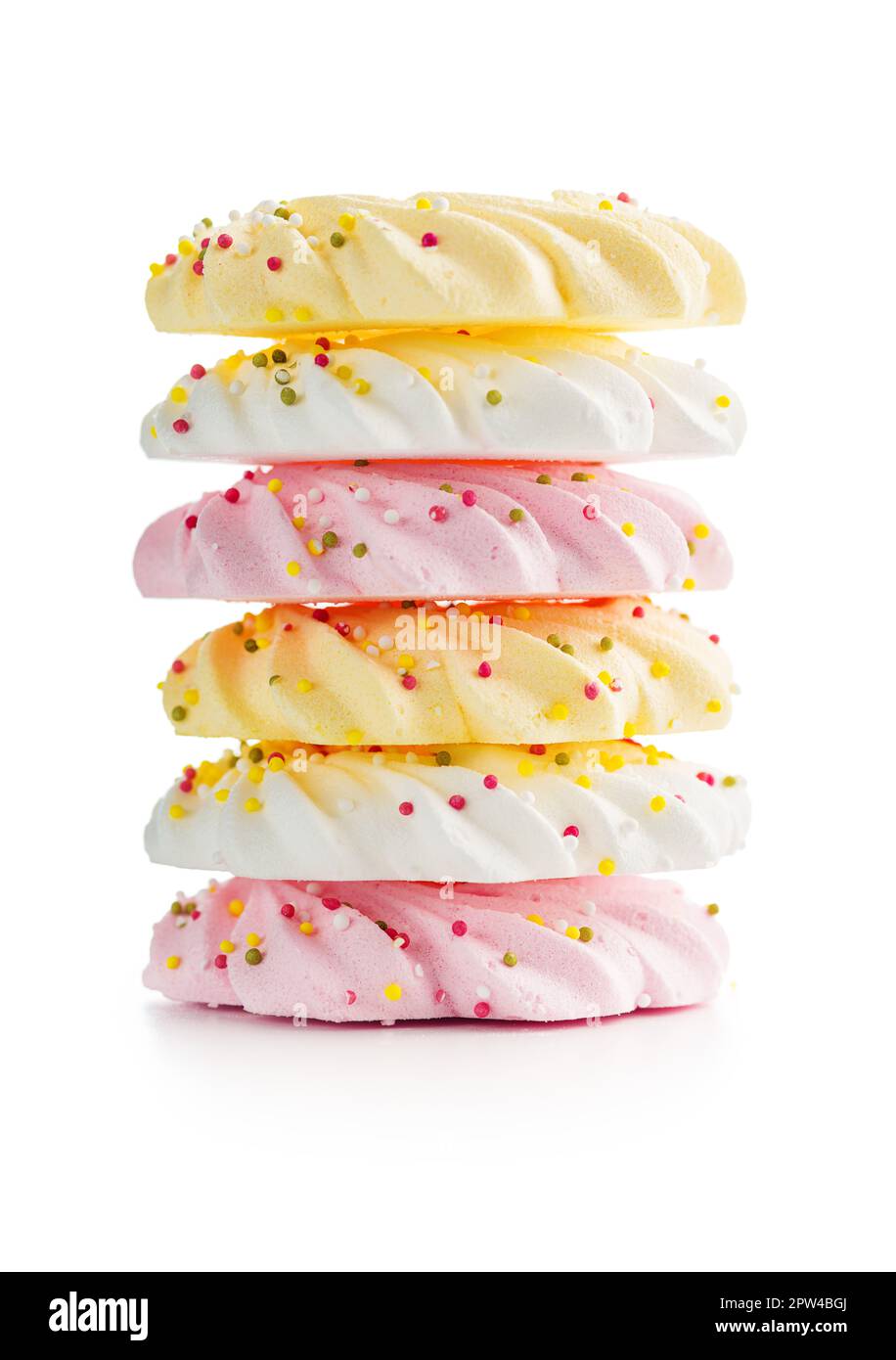 Different colors meringues with sprinkles isolated on the white ...