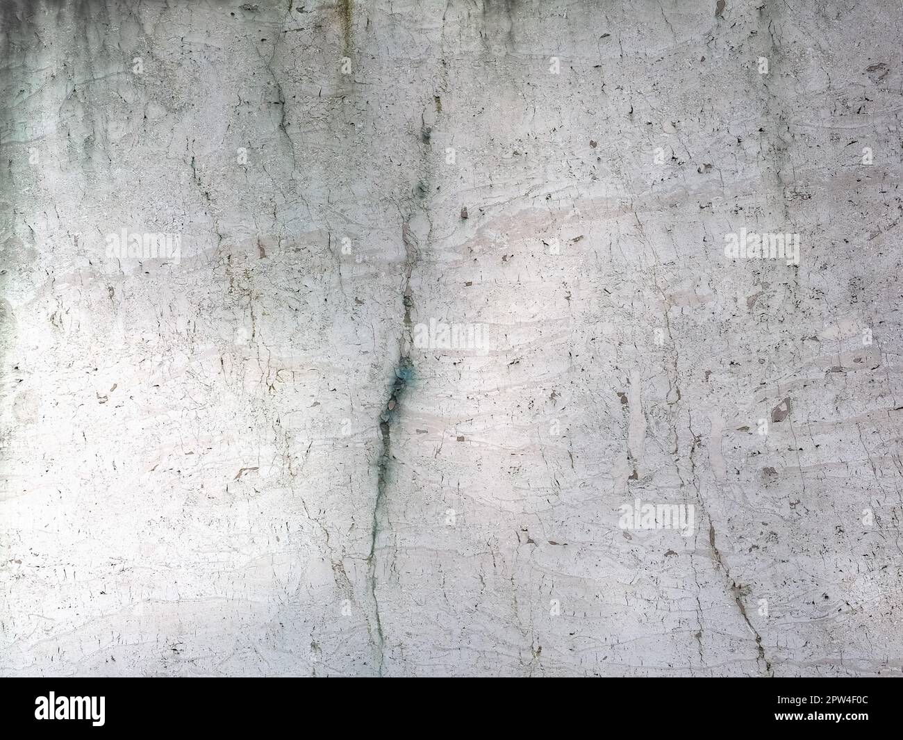 grey stone wall useful as a background Stock Photo - Alamy