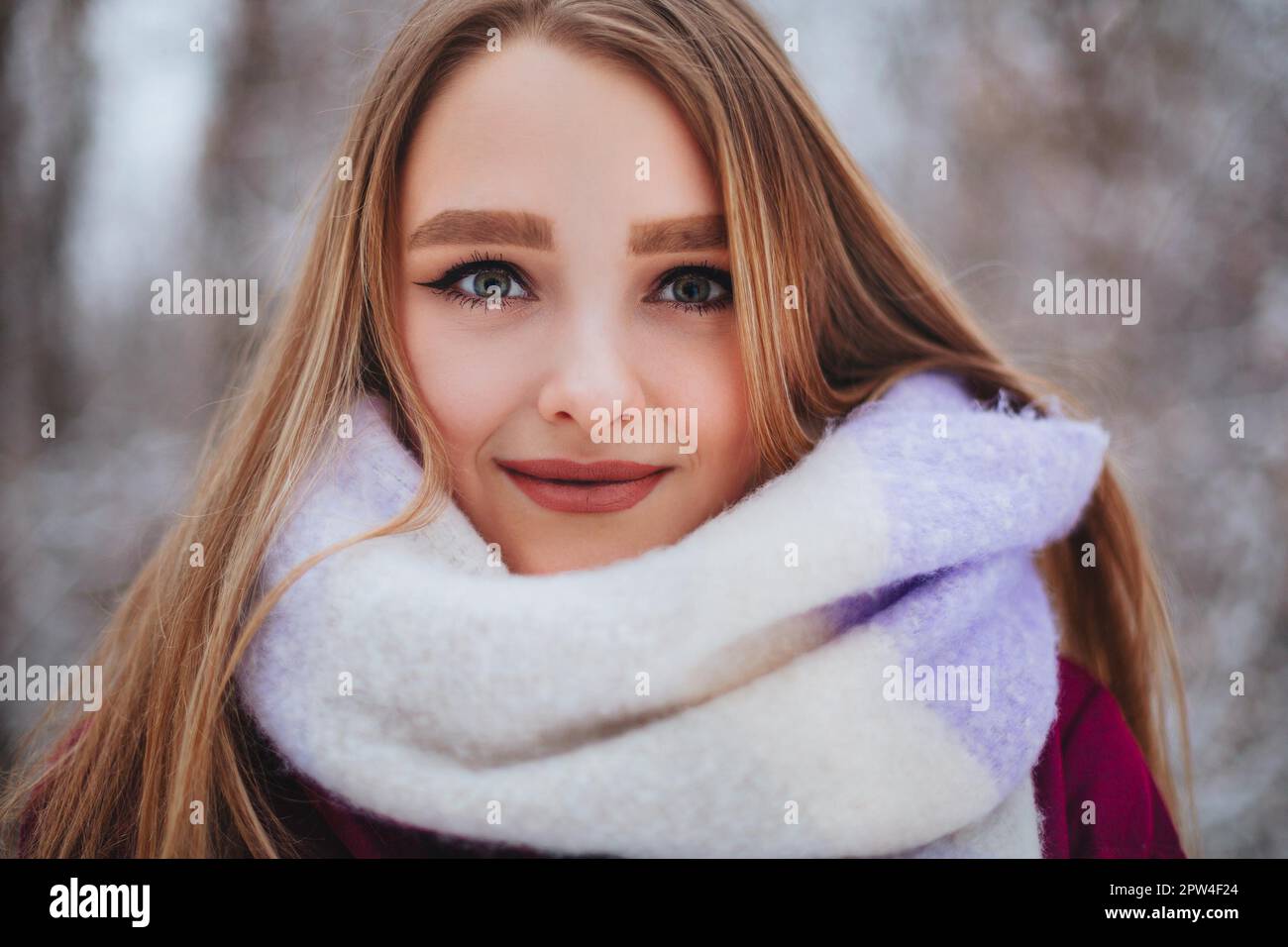 Closeup photo of beautiful female with sharp look, half of young woman