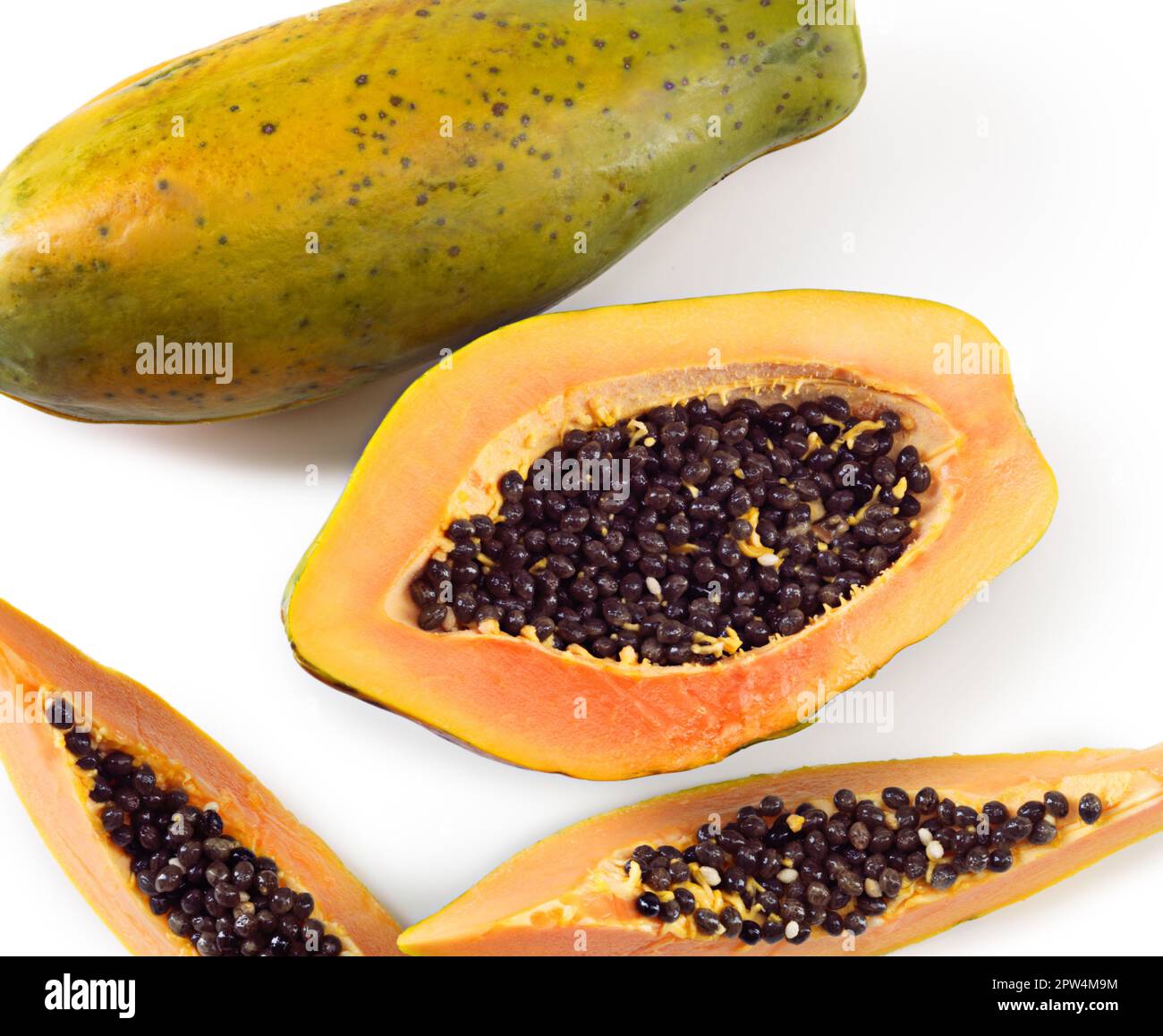 Its pawpaw season. Studio shot of papaya fruit against a white