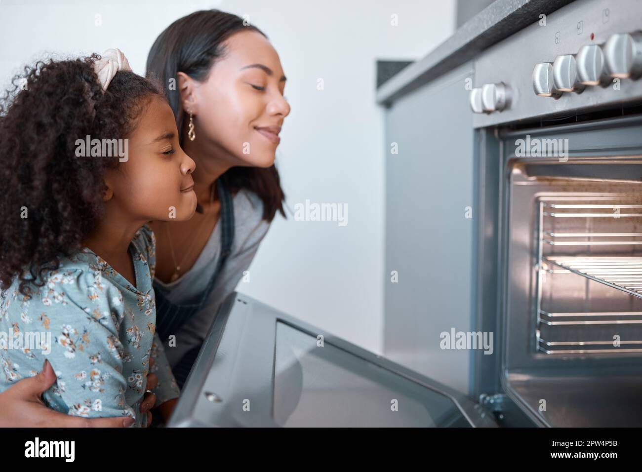 Family, food and oven cooking smell with meal preparation for lunch