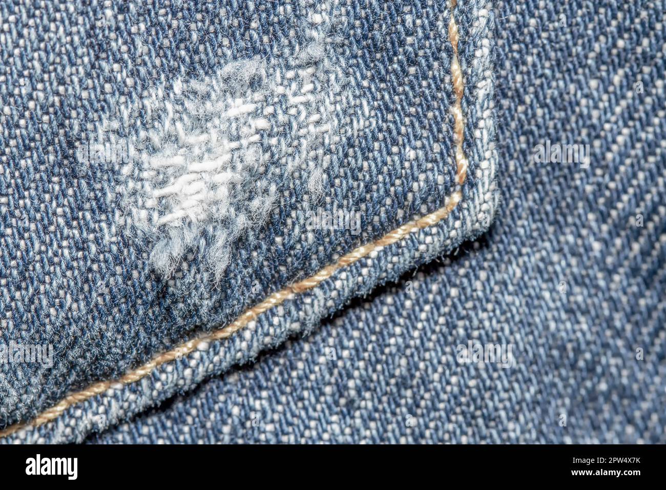 Jeans texture background and seam for text area Stock Photo - Alamy