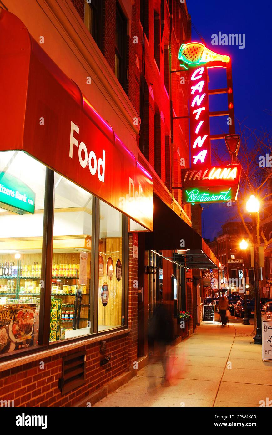 Neon lights of the restaurants and bars illuminate the streets at night