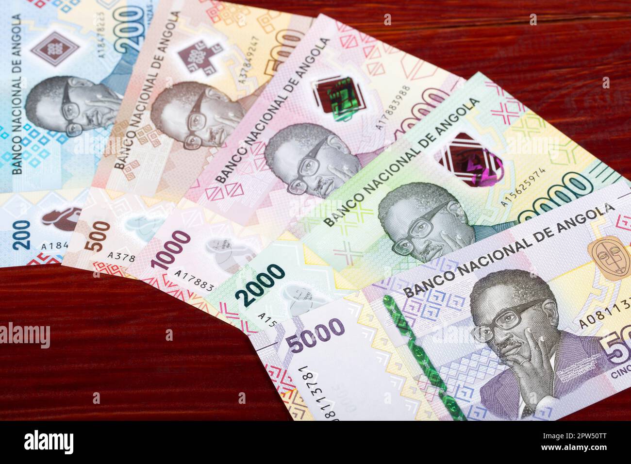 Angolan money - kwanza a business background Stock Photo - Alamy