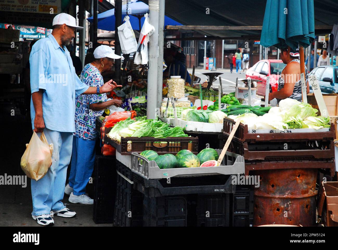 Shoppers seek fresh fruits and vegetables at Philadelphia's historic Italian Market Stock Photo