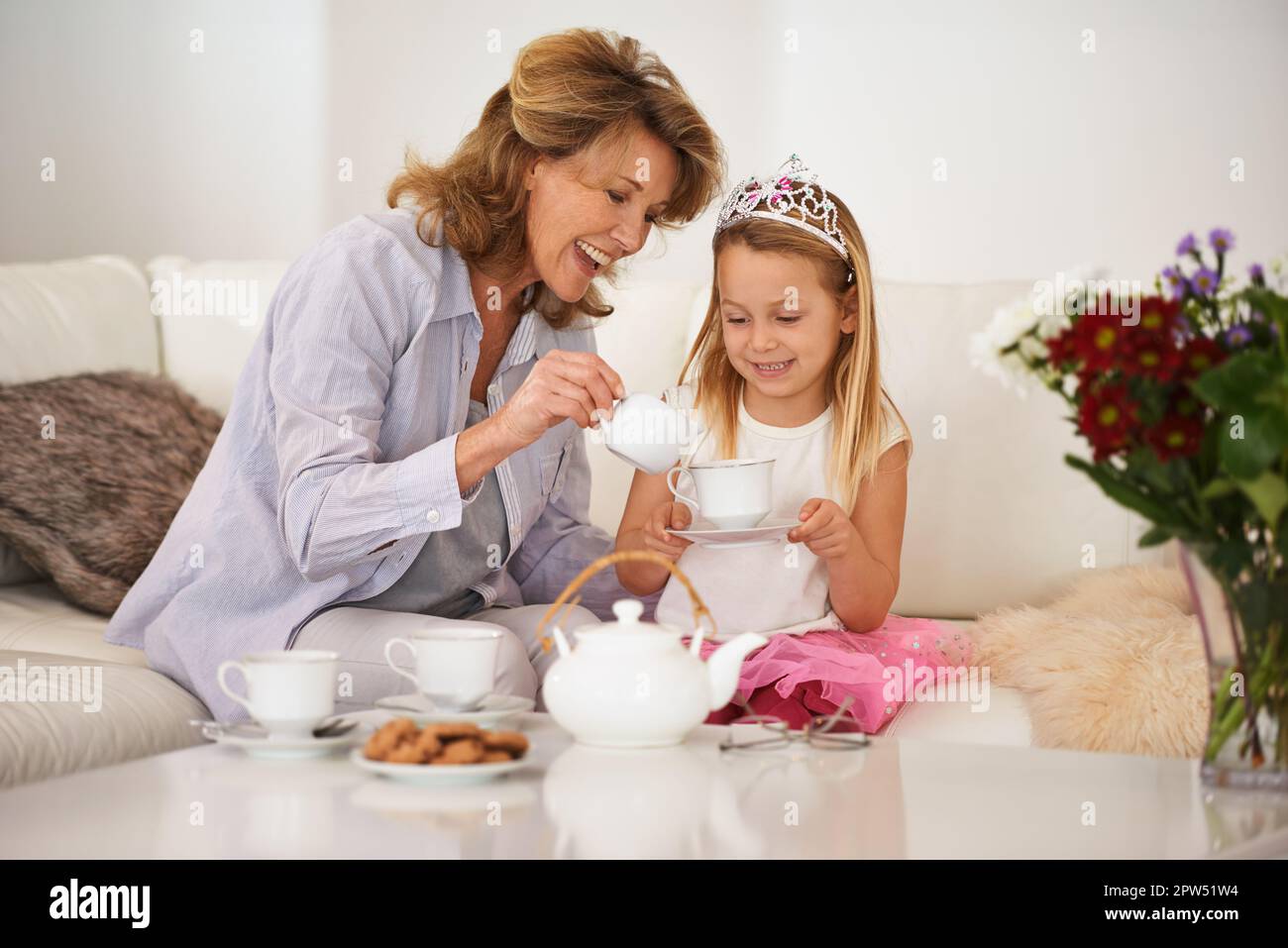 Bonding with granny. a grandmother and her granddaughters enjoying a
