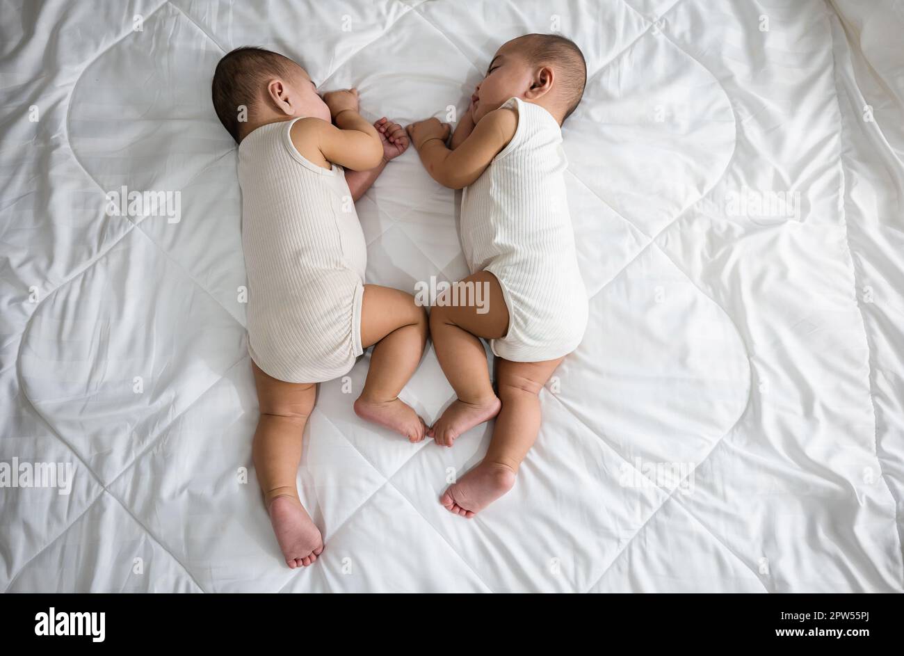 Asian two adorable twin babies boy, Happy childhood, Sleeping newborn