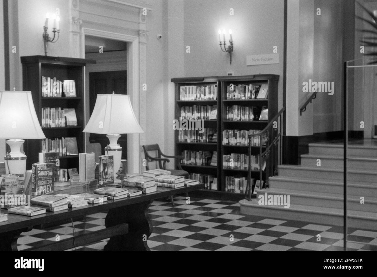 The entrance to the Lucius Beebe Memorial Library with new books displayed on a large table. Wakefield, Massachusetts. The image was captured on analo Stock Photo