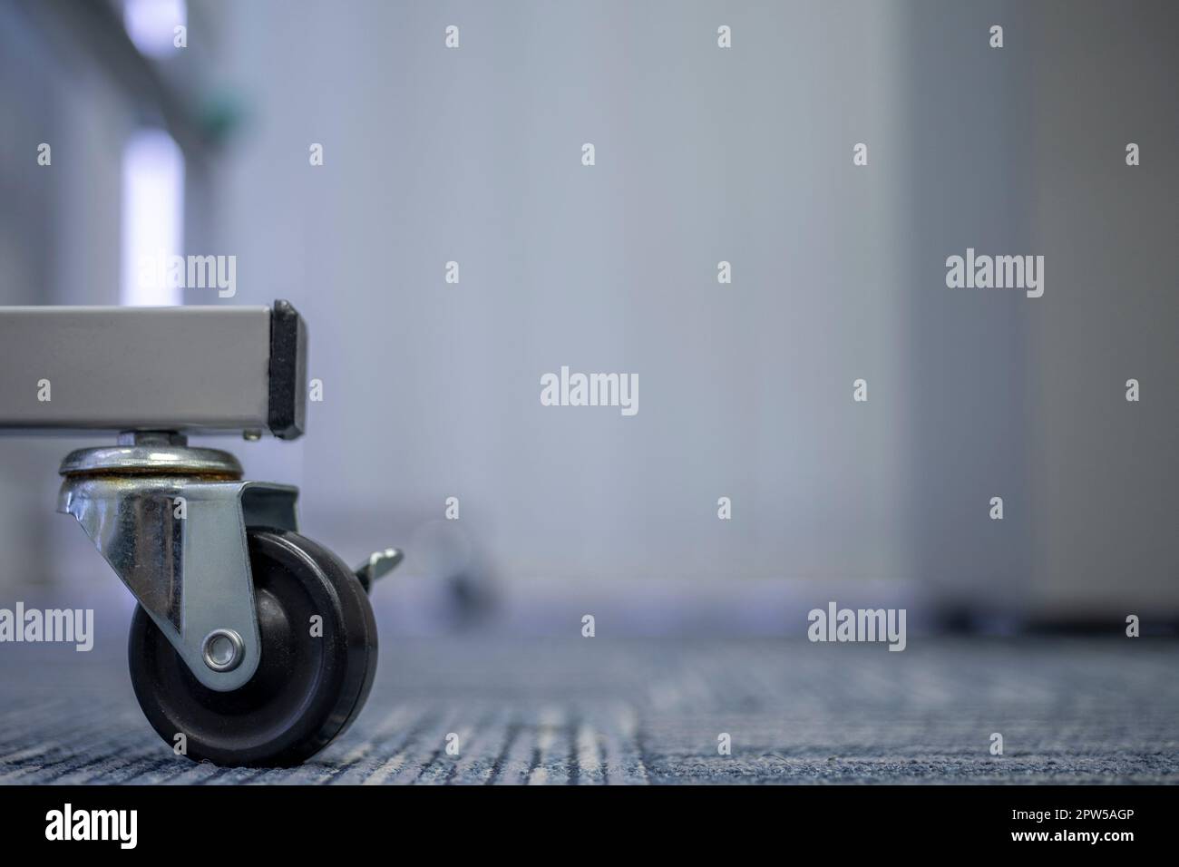 Small black rubber wheels on the carpet Stock Photo Alamy