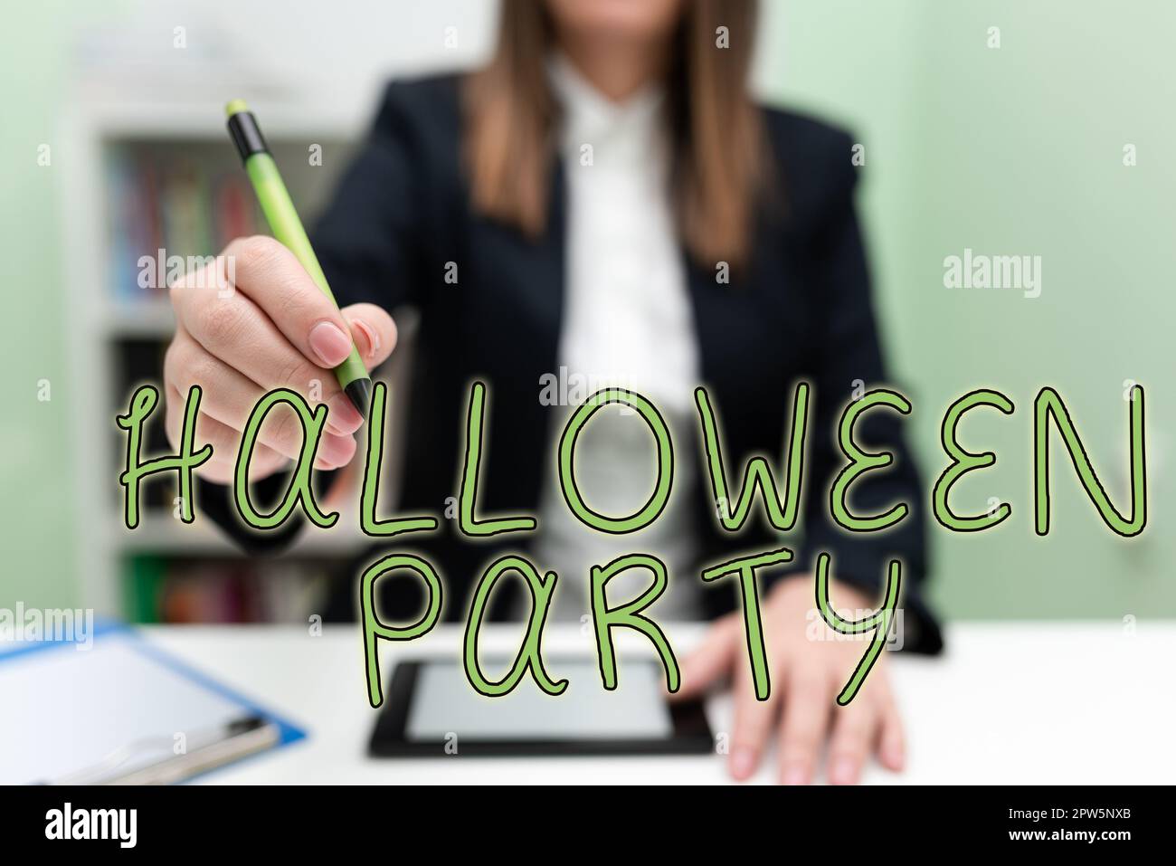 Sign displaying Halloween Party, Word for eve of the Western Christian feast of All Hallows Day Stock Photo