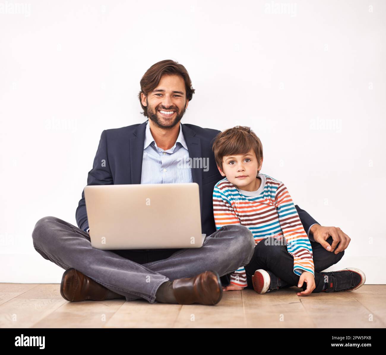 Father children sitting on knee hi-res stock photography and images - Alamy