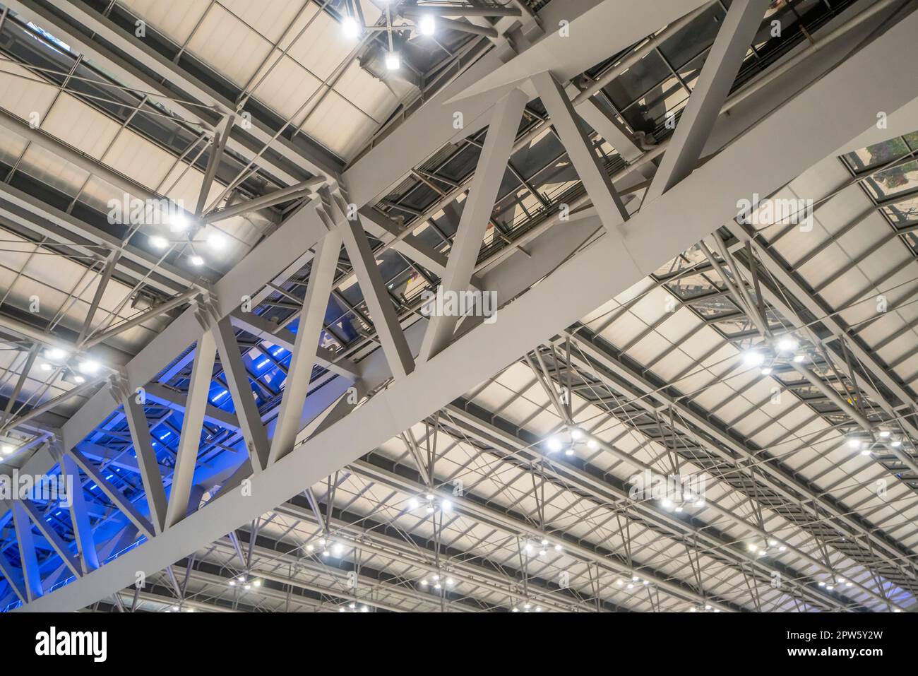 Large steel frame in the building with spotlights Stock Photo Alamy