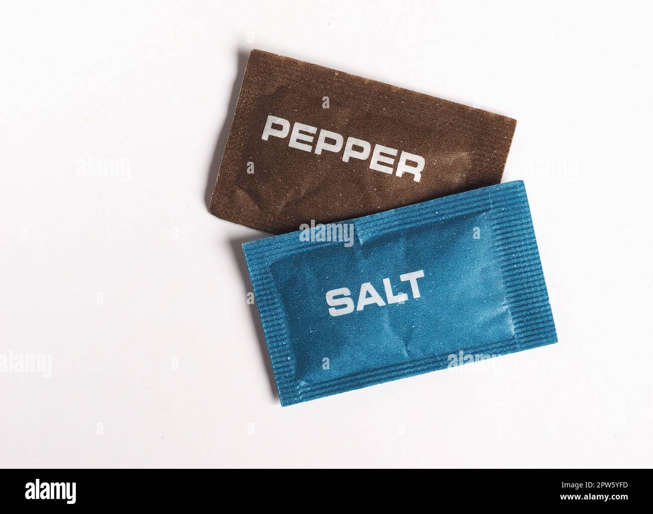 single dose salt and pepper sachet for restaurants and pubs Stock Photo
