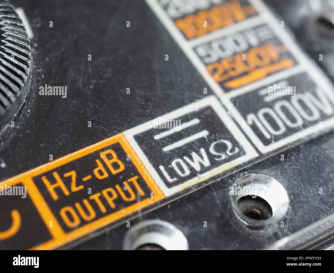 electrical symbols on a vintage analog multimeter measuring instrument